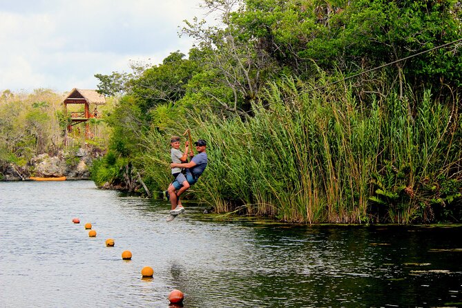 4 Private Cenotes, Zip-Lines, Canoes & Mayan Village with Delicious Lunch - Snorkeling in open water and caves