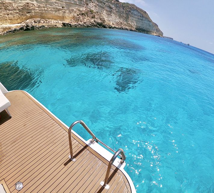 5 hours Lampedusa: Boat Tour with panino SUP e snorkeling - SUP Time on the Mediterranean
