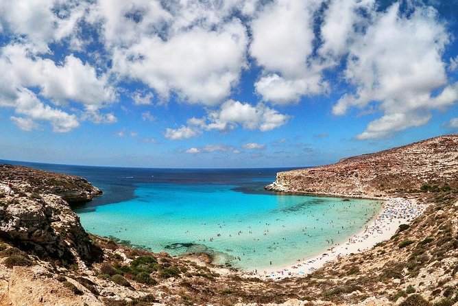 7 hours Boat trip to Lampedusa lunch, SUP and Snorkeling - The famous beach and its marine reserve limits