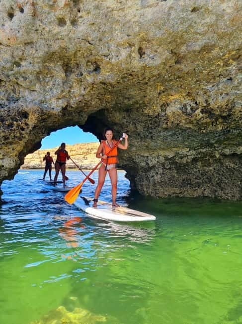 Albufeira: Caves and Beaches SUP Paddleboarding Tour - A break on a beach reached by sea