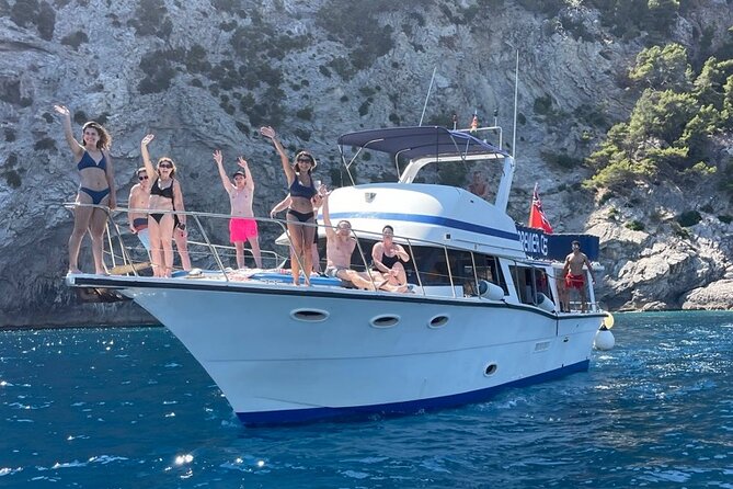 Alcudia 3hr Sunset Trip with Drinks, Tapas, SUP & Snorkel - The northern coast, cliffs, and caves