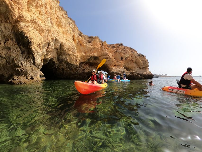Alvor: Explore Caves Boat and Kayak Tour - A swim from the boat rounds out the outing