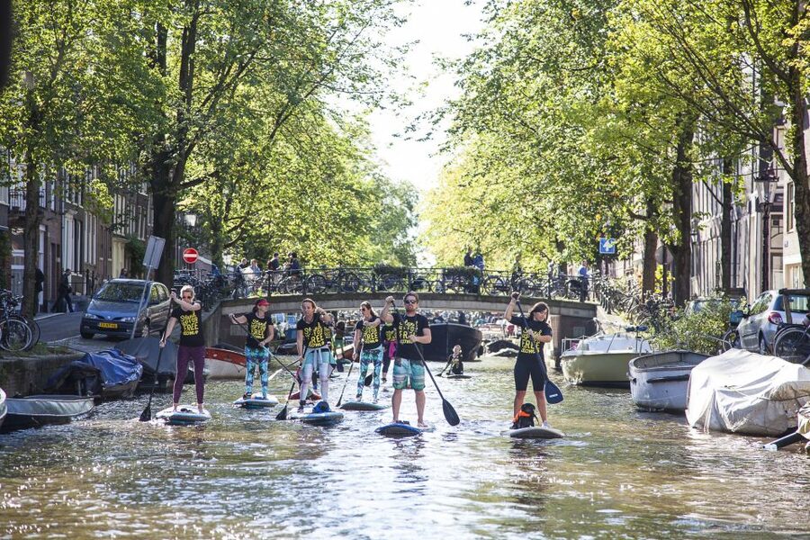 Amsterdam: 2-Hour Stand Up Paddle Board Tour - Learning to balance on a quiet canal