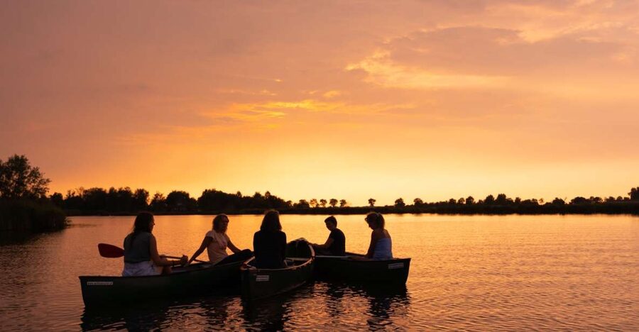 Amsterdam: Dutch Countryside Sunset Canoe Tour - Leaving Amsterdam Noord for the polders