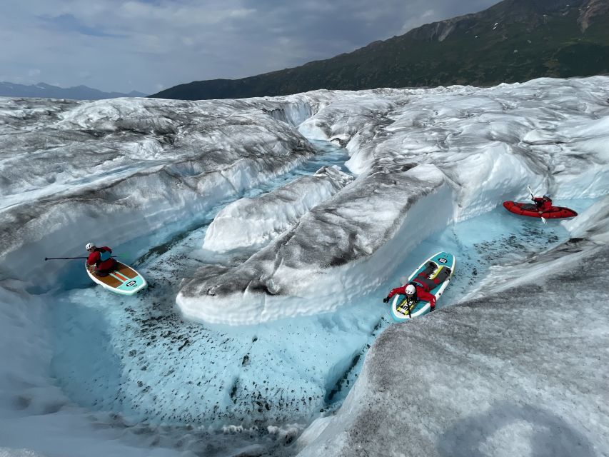 Anchorage: Knik Glacier Helicopter and Paddleboarding Tour - Getting ready for a freezing glacier swim