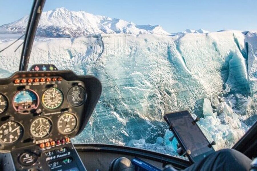 Anchorage: Knik Glacier Helicopter and Paddleboarding Tour - Paddleboarding across remote glacier pools