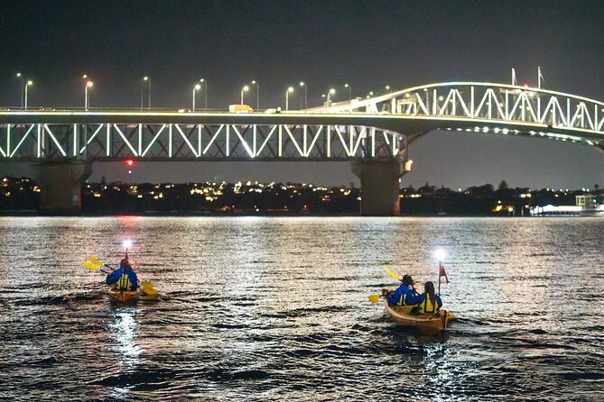 Auckland City Lights Night Kayaking Tour - Paddling beside the Auckland Harbour Bridge