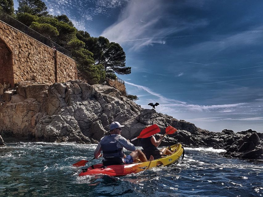Barcelona: Costa Brava Tour with Kayak & Lagoon Snorkeling - Kayaking through sandstone coves and cliffs