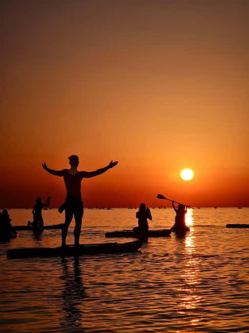 Barcelona: Paddleboarding at Sunrise. Includes: instructor, photos, equipment - Cancellation and booking details