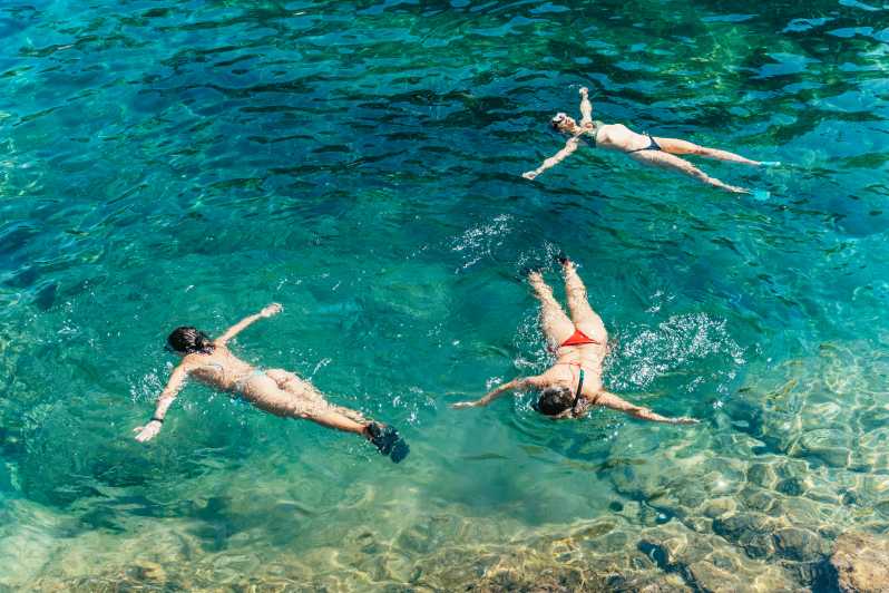 Barcelona: Tossa de Mar Kayak & Snorkel Tour w/3-Course Meal - Snorkeling in clear Mediterranean coves
