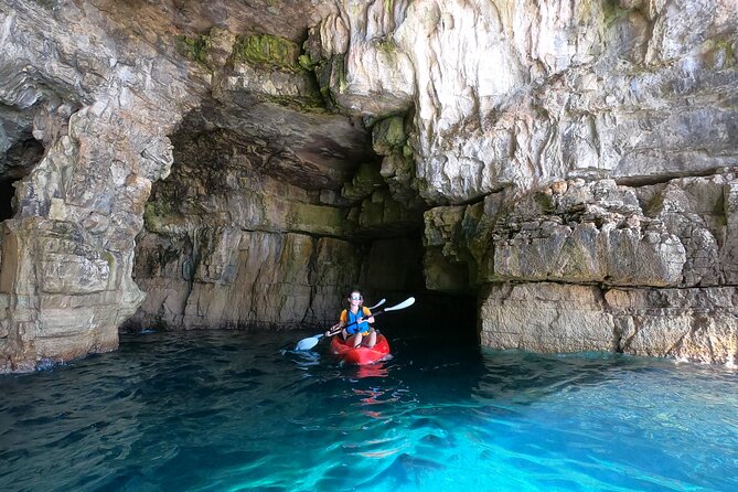 BOAT & KAYAK! Sea Adventure - Snorkeling & Cliff Jumps - Paddling past Pula’s cliffs and rocky passages