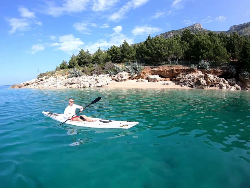 Bol: Zlatni Rat Beach Kayak Tour with Snorkeling - Along the coast to coves and caves