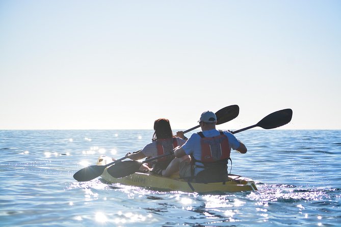 Cabo San Lucas Glass Bottom Kayak Tour and Snorkel at Two Bays - Scheduling, weather, and cancellation details