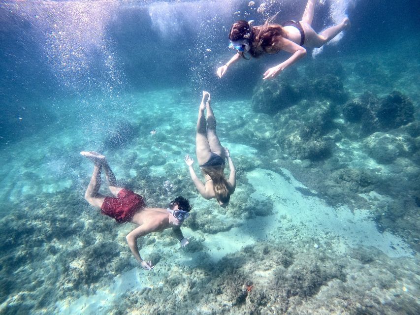 Cagliari: Stand Up Paddleboarding (SUP) Tour & Snorkeling - Exploring small caves and secret beaches