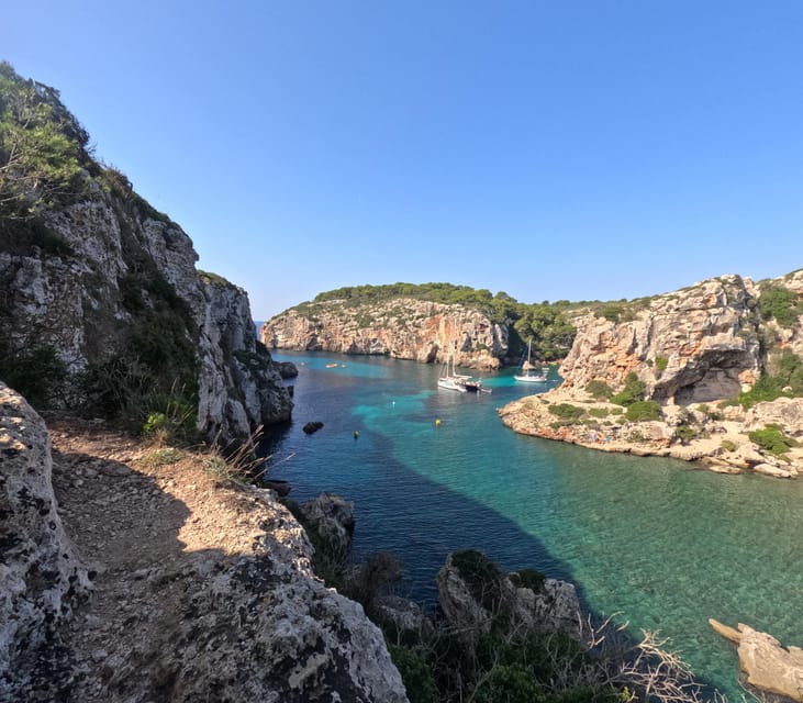 Cala en Porter: Menorca Caves Kayaking Tour & GoPro Photos - Paddling the cliffs and first caves