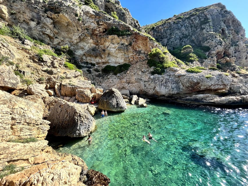 Cala Tango: Marine Reserve Cave & Snorkel Paddle Board Tour - Snorkeling at Illot de la Mona