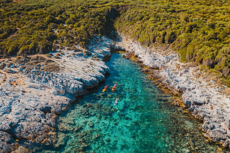 Cape Kamenjak: Cave and Safari Experience by Kayak - Entering the Kolombarica caves by kayak