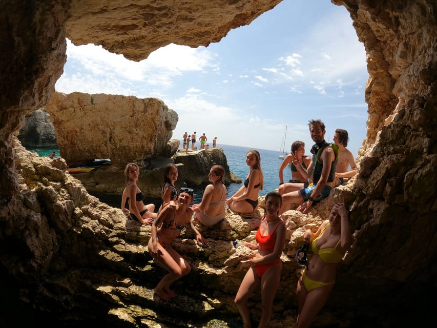 Cape Kamenjak: Kayak Tour with Cave Experience - Snorkeling with fish below the cliffs