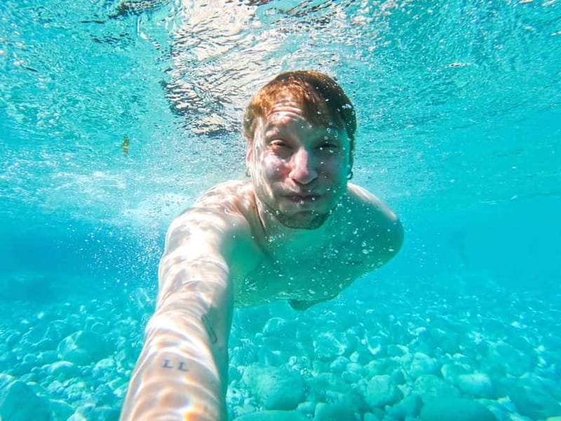 Capri: Caves and Beaches Kayaking Tour with GoPro Photos - Paddling out from Marina Piccola