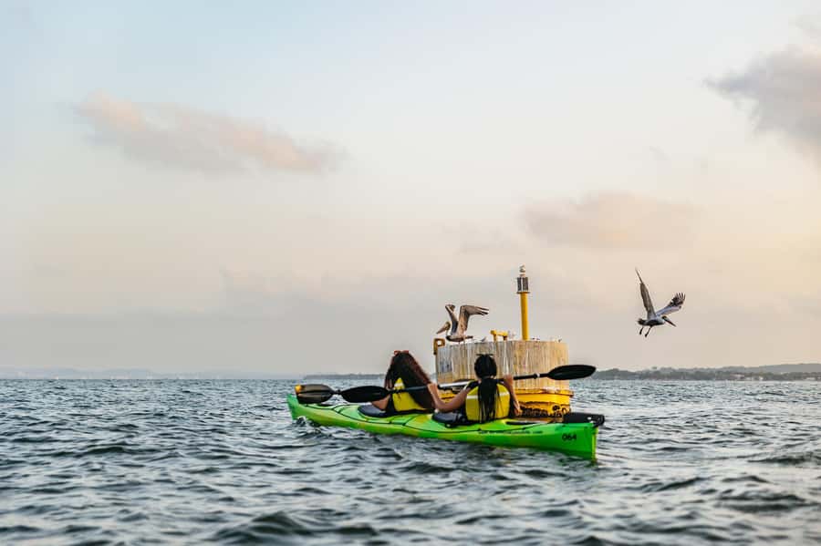 Cartagena: Sunset Sea Kayaking Tour - Returning to shore with a different view of Cartagena