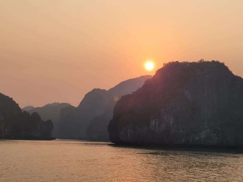 Cat Ba: Day boat tour with: kayak, cave, bike, meal, tickets - Swimming at Ba Trai Dao, with a jump from the deck