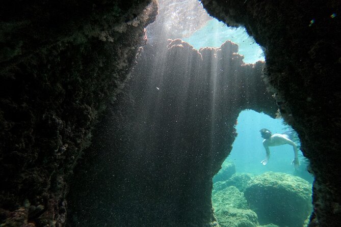 Cave exploring by kayak - Snorkeling in clear Adriatic water
