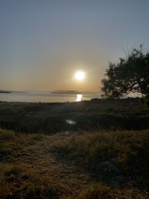 Chania: Stand-up Paddleboard Coastal Sunset Experience - Watching the sunset from the board