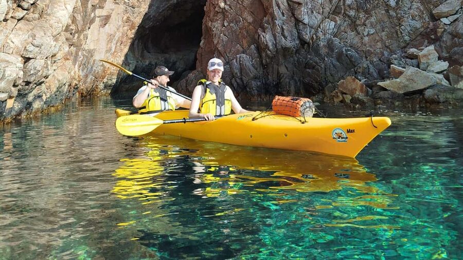 Chia: kayak tour to Tuerredda with snorkeling - Ferraglione’s islands and the natural pools