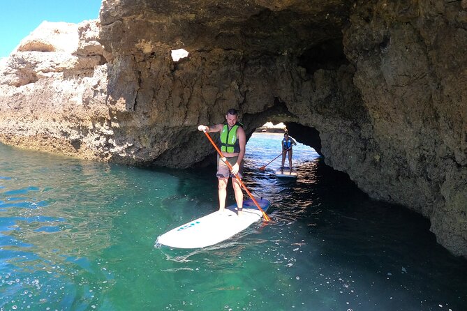Cliffs & Caves Stand Up Paddle Adventure - Returning to the starting beach