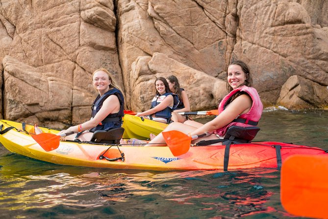 Costa Brava Kayak & Snorkel Tour + Picnic from Barcelona - Kayaking along the rocky coast