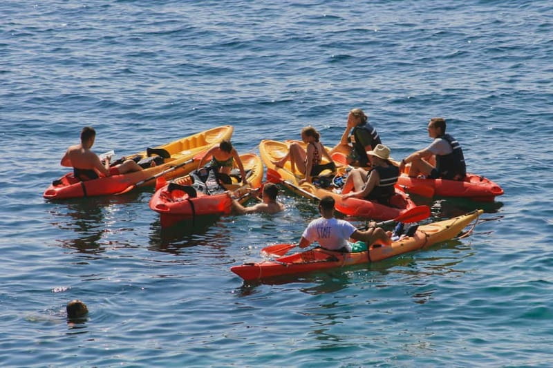Costa Brava: Sant Feliu de Guíxols Kayak & Snorkel Tour - Arriving at the blue flags