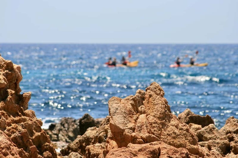 Costa Brava: Sant Feliu de Guíxols Kayak & Snorkel Tour - The snorkeling stop in clear Mediterranean water