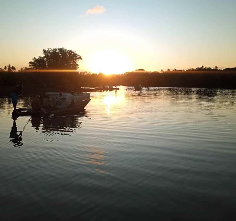 Diani Beach: Kongo River Sunset Experience in a canoe - Boarding the traditional canoe
