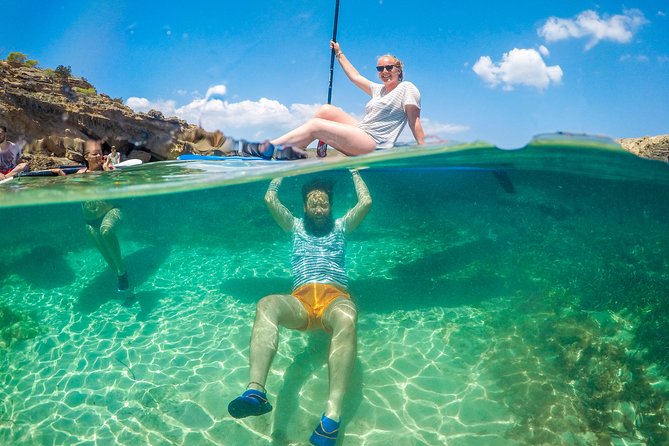 Discover the best corners of the island in paddle surf - Two hours among cliffs, caves, and quiet water