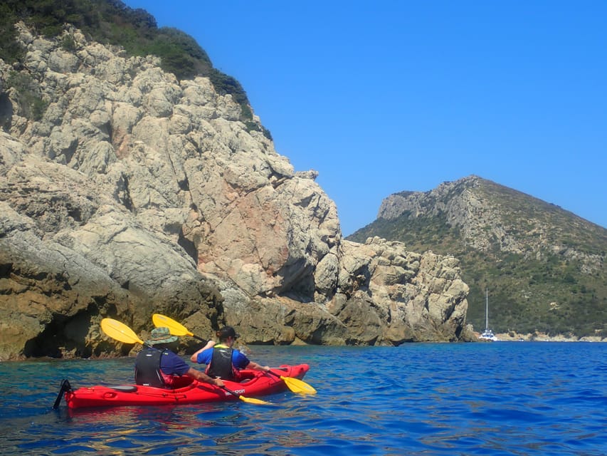 Dolphin Kayak Safari at Sunset at Golfo Aranci - Paddling toward Isola di Figarolo