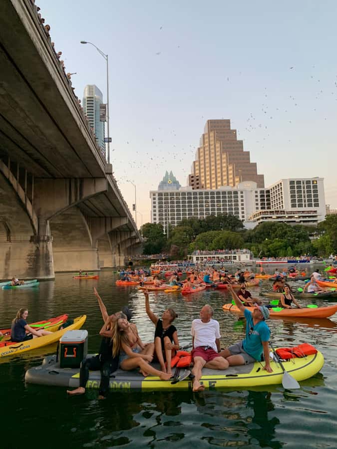 Downtown Sunset Tandem Kayak with 1.5M Bats - Golden-hour paddling through downtown