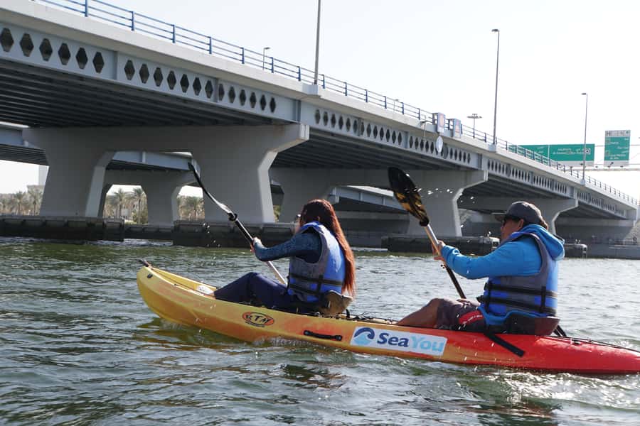 Dubai: Sunset/Night Dubai Creek Kayak Tour - Safety briefing, life jacket, and launch