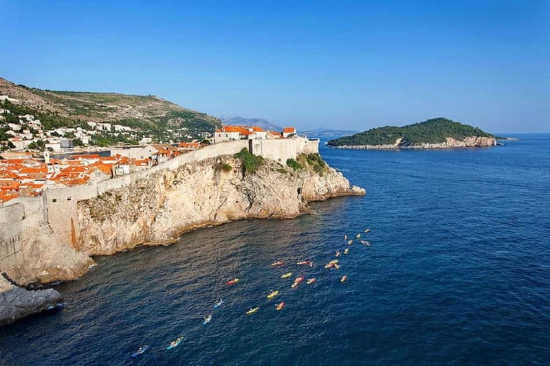 Dubrovnik: Guided Sunset Sea Kayaking Tour with Wine - Along Dubrovnik’s walls from Pile Gate