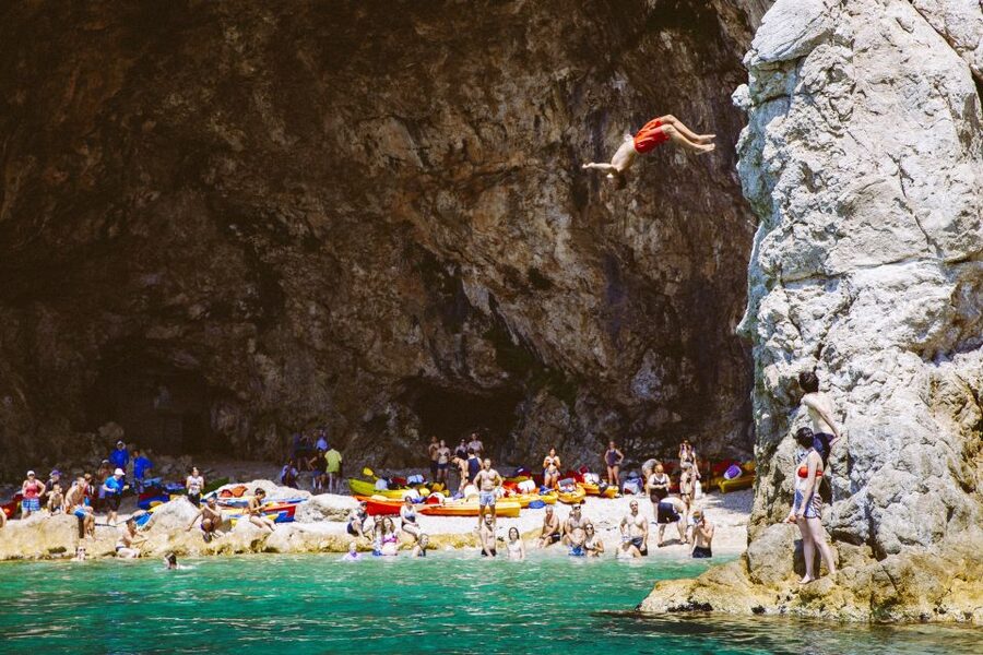 Dubrovnik: Sea Kayaking Half-Day Tour - Returning beneath Dubrovnik’s old walls