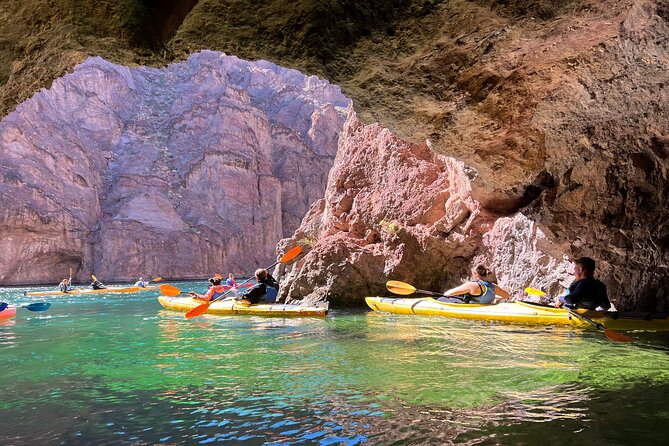 Emerald Cave Express Kayak Tour with Scenic & Historic Stops - A beach stop, snacks, and cold water