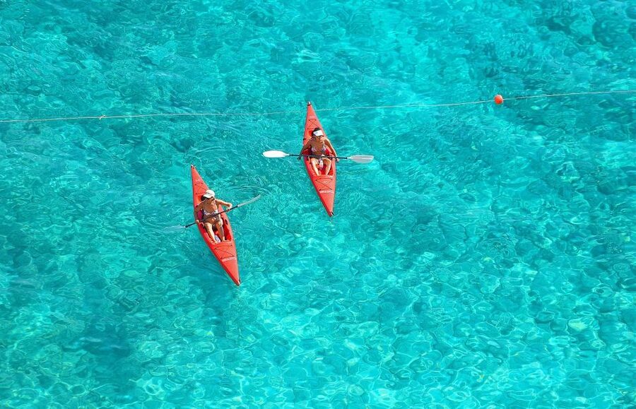 Explore Santorini's Waters: Kayak Rental Adventure - One hour along the black-sand coast
