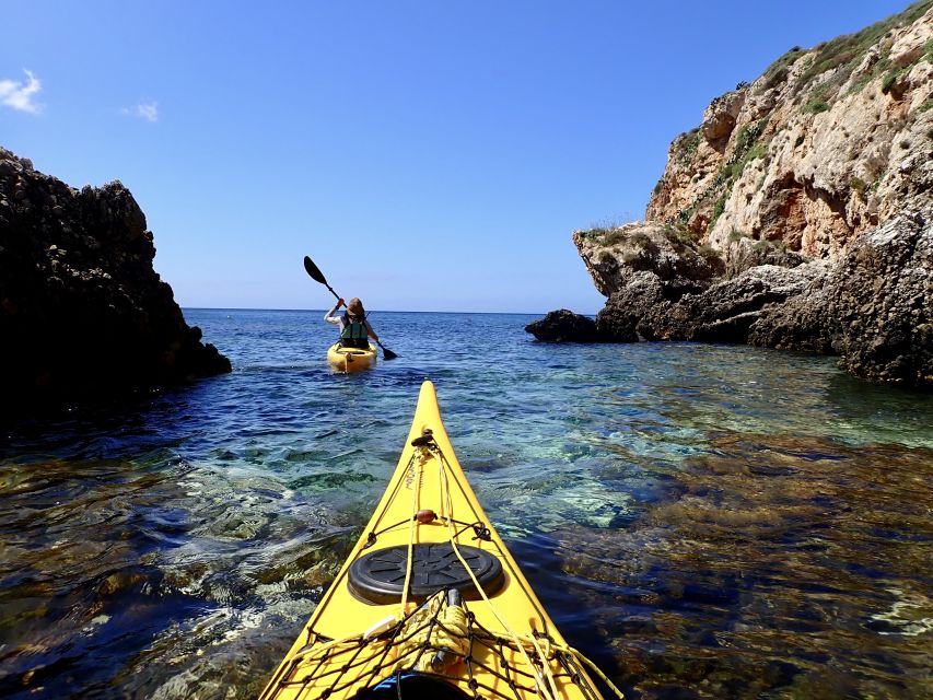 Favignana: kayak excursion, snorkelling and adventure - Paddling past coves and rocky shore