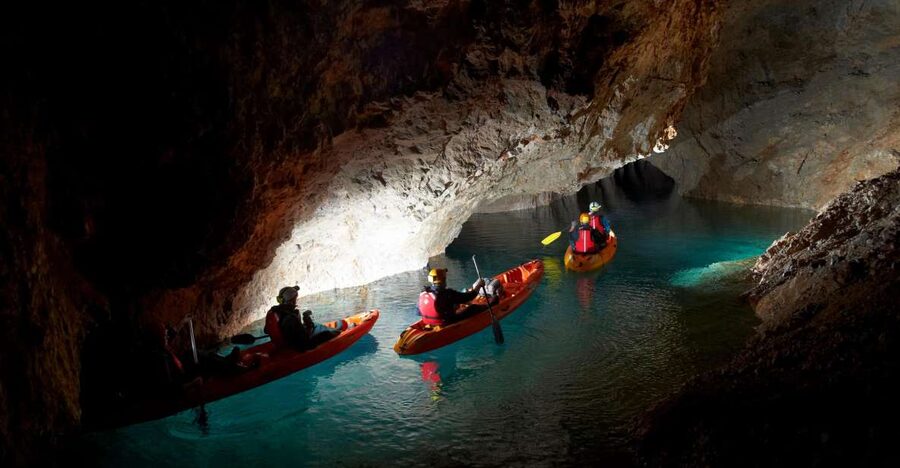 From Bled: Full-Day Underground Kayaking - The old train and the descent underground