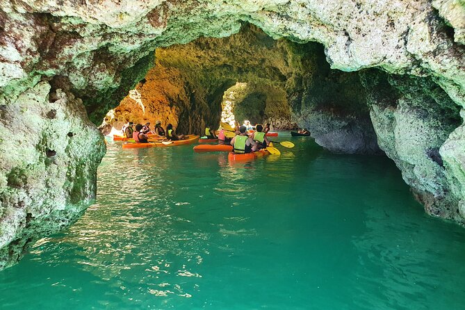 From Lagos: Kayak Tour of Ponta da Piedade Caves on Catamaran - Swimming time and the ride back