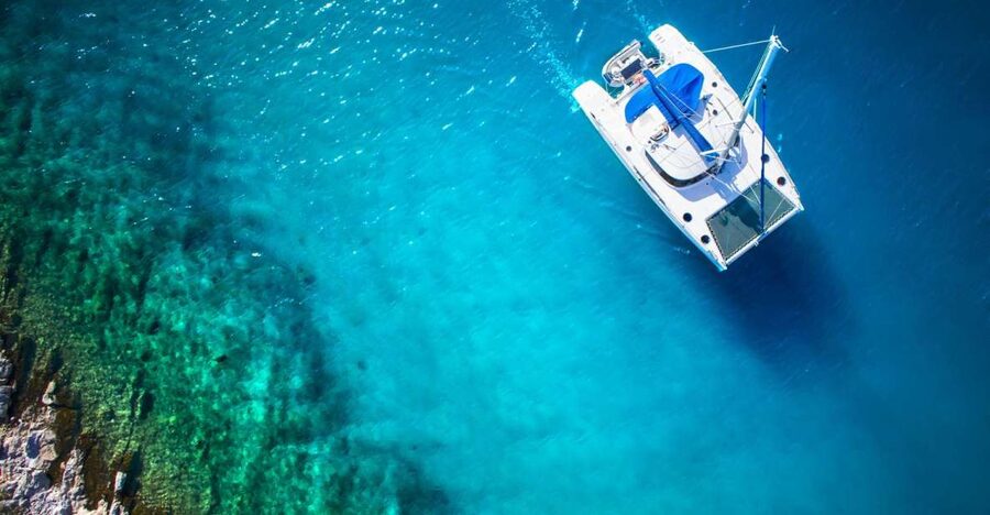 From Ornos: Mykonos Delos Catamaran Cruise with Meal & SUP - Key points to know before booking
