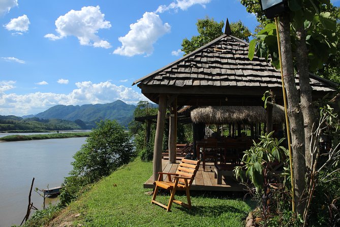 FULL DAY – Kuang Si Waterfall, Kayak on the Nam Ou / Mekong River, Pak Ou Caves - Kayaking beneath the Pha Aen limestone cliffs