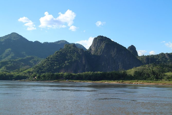 FULL DAY – Kuang Si Waterfall, Kayak on the Nam Ou / Mekong River, Pak Ou Caves - A short Whisky Village stop