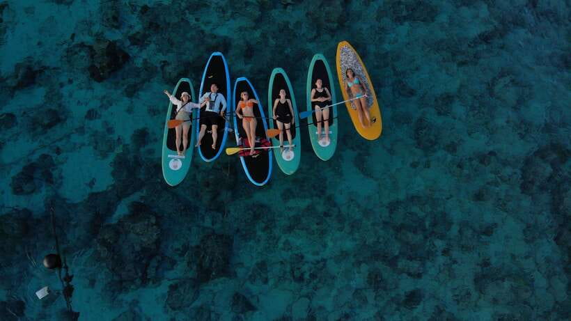 gili sunrise Stand-up paddle boarding or kayaking (droneshot - Starting with a paddleboard or kayak lesson
