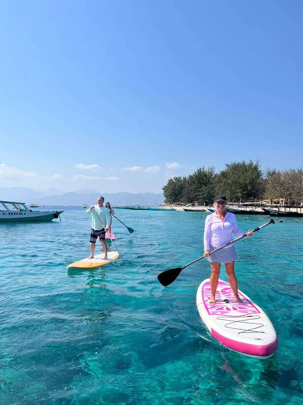gili sunrise Stand-up paddle boarding or kayaking (droneshot - A quieter stop at Gili Meno’s lake