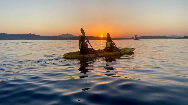 Golfo Aranci:Small group, german guided Kayak tour&Dolphins - Meeting the yellow kayaks at Baracconi Beach